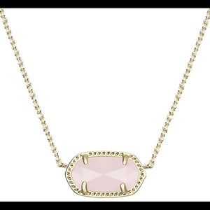 Used Rose quartz Kendra Scott with a gold chain.